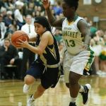 Arlington&rsquo;s Serafina Balderas (left) drives past Bishop Blanchet&rsquo;s Taylor Chambers during a 3A state regional game on Saturday at Mountlake Terrace High School.
