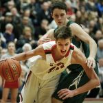 King&rsquo;s Chewy Zevenbergen battles through the defense of Vashon Island&rsquo;s Josh Tillman during a 1A state regional game on Saturday at Mountlake Terrace High School.