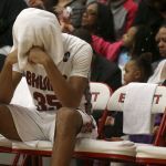 Cascade&rsquo;s Isaiah Gotell sits dejected in the closing minutes of a 4A state regional loss to Kentwood on Saturday at Everett Community College.