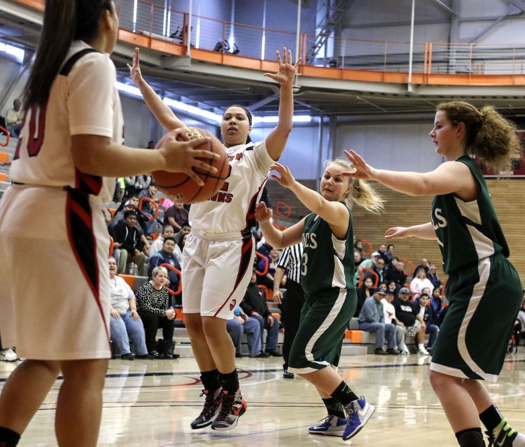 Tulalip Heritage&rsquo;s Aliya Jones looks to make an inbound pass during a 1B state regional game Saturday at Everett Community College. Tulalip Heritage won 54-42.