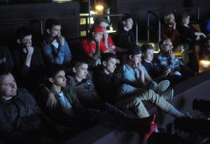 Members of the King&rsquo;s High School basketball team sit in the upper balcony at the Edmonds Center for the Arts as they watch the documentary film "Saved For A Reason" on Sunday night.