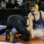 Arlington&rsquo;s Ruben Crew (right) defeated Central Kitsap&rsquo;s Calvin Fischer to win the Class 3A 170-pound state championship on Saturday.