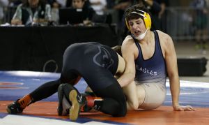 Arlington&rsquo;s Ruben Crew (right) defeated Central Kitsap&rsquo;s Calvin Fischer to win the Class 3A 170-pound state championship on Saturday.