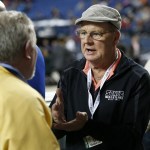 Arlington wrestling coach Rick Iversen (right) announced his retirement following the finals of Mat Classic XXVIII on Saturday.