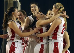 The Snohomish girls react after defeating Bothell 47-41 in a 4A state semifinal game on Friday night at the Tacoma Dome.