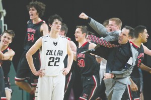 Coach Rick Skeen and the King&rsquo;s bench react to Luke Wicks&rsquo; game-winning basket as Zillah&rsquo;s Nate Whitaker (22) looks on.