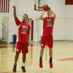 King&rsquo;s Cole Mitchell (left) and Corey Kispert take shots during practice for the state quarterfinals at King&rsquo;s High School on Tuesday.