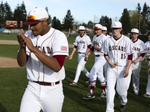 Cascade&rsquo;s Brennen Hancock (left) celebrates with teammates after a 6-5 win over Snohomish on Wednesday in Everett.
