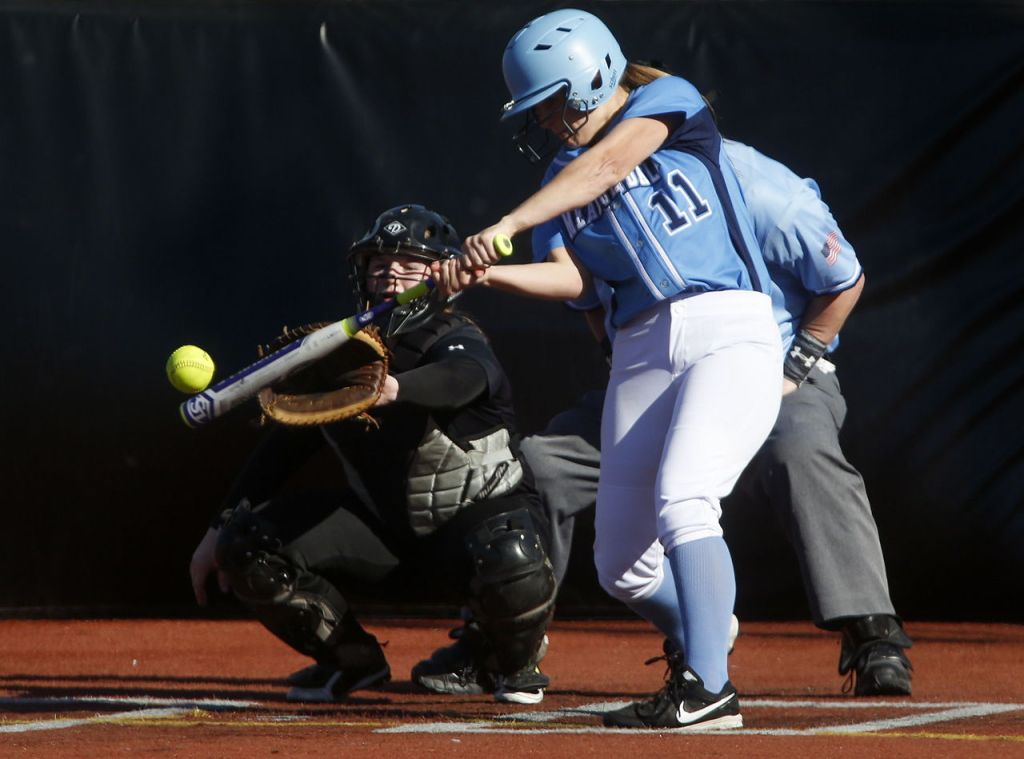 Meadowdale&rsquo;s Kaitlyn Webster connects with a pitch for a single during a game against Lynnwood on Friday at Lynnwood High School.