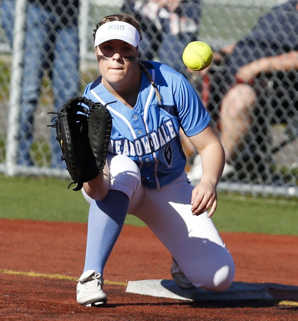 Meadowdale&rsquo;s Samantha Gregoryk eyes a throw coming in to first base during a game against Lynnwood on Friday at Lynnwood High School.