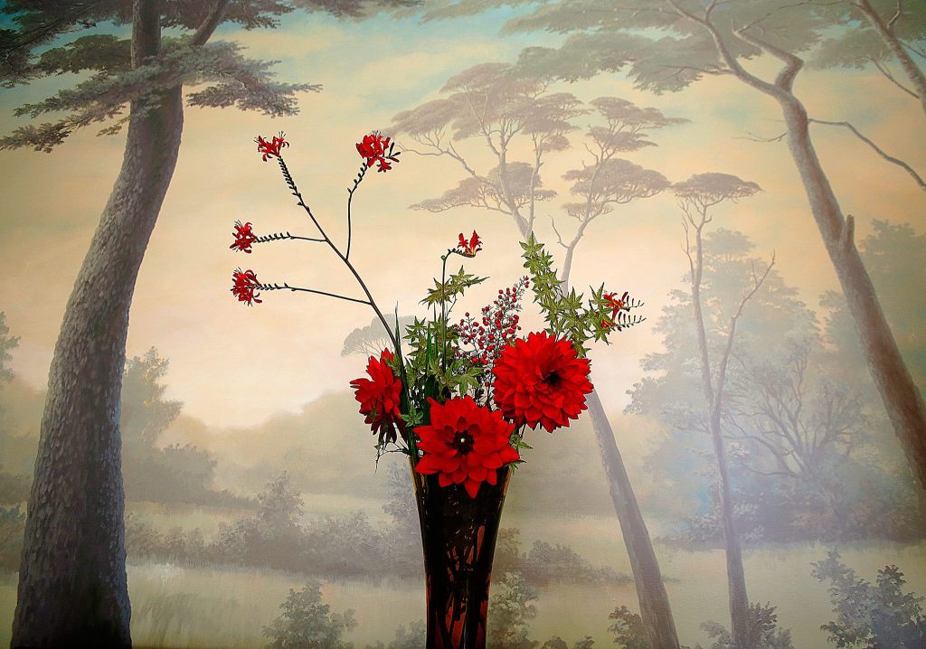 A vase-full of red blooms stands in contrast with Andy Eccleshall&rsquo;s full-room mural in the dining room of Jennifer Kaump and Donald Kaump&rsquo;s north Seattle home. (Dan Bates/The Herald)