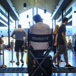 An employee awaits moviegoers at Cinebarre. (Kevin Clark / The Herald)