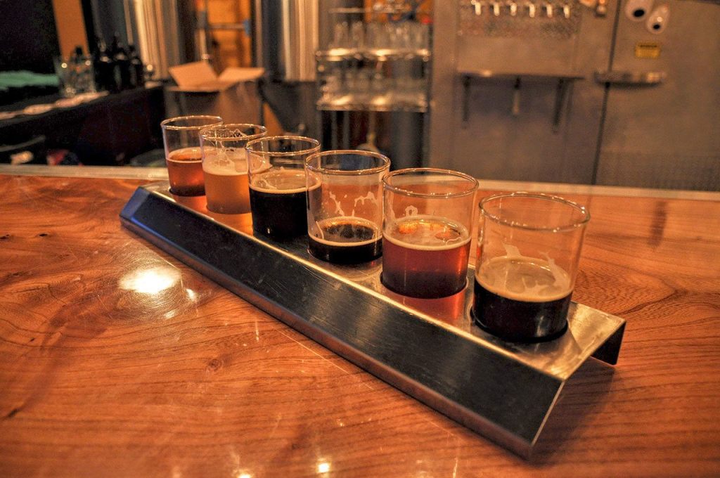 If you can&rsquo;t decide on a beer, try the sampler at River Time Brewing in Darrington. (Brandon Fralic / For The Herald)