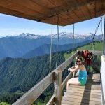 Rachel Wood relaxes at the Green Mountain Fire Lookout. (Brandon Fralic / For The Herald)