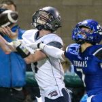 Glacier Peak&rsquo;s Seiver Southard attempts a catch with Bothell&rsquo;s Kevin Liu trailing Thursday night at Pop Keeney Stadium in Bothell. (Kevin Clark / The Herald)