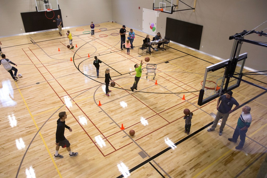Visitors and members play in the gym at the Grand Opening of the Stanwood-Camano YMCA on Sept. 3, 2016, in Stanwood. (Andy Bronson / The Herald)