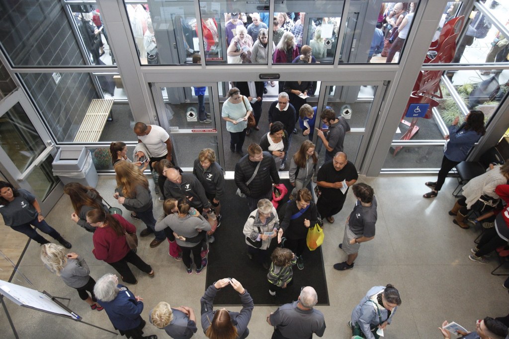 Hundreds of visitors and members enter the new Stanwood-Camano YMCA on the Grand Opening day on Sept. 3, 2016, in Stanwood. (Andy Bronson / The Herald)