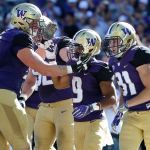 Browning tosses 5 TDs, No. 8 Washington routs Idaho 59-14