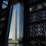 The Washington Monument is framed by a window at the National Museum of African American History and Culture in Washington on Wednesday. (AP Photo/Susan Walsh)
