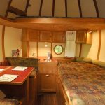 In Vancouver Island&rsquo;s rain forest, a treehouse hotel is fit for a hobbit. Show is the Eryn sphere&rsquo;s interior as seen from the doorway with bed to the right and table to the left. (Photo by Adam Clarke)