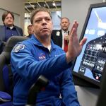 NASA astronaut Bob Behnken explains an ascent simulation on one of Boeing&rsquo;s CST-100 Starliner training simulators at the Johnson Space Center in Houston on Wednesday. (Jennifer Reynolds/The Galveston County Daily News)