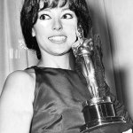 Rita Moreno holds the Oscar she won in 1962 as best supporting actress for her role in &ldquo;West Side Story.&rdquo; (Associated Press)