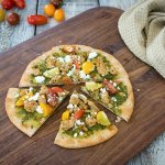 This pesto pita pizza uses lighter ingredients to nourish and energize your body rather than drag it down. (Photo by Rose McAvoy)