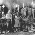 Judy Garland, as Dorothy in &ldquo;The Wizard of Oz,&rdquo; is presented with the Witch&rsquo;s broom in a scene from the 1939 movie. Garland is accompanied by, from left to right, Bert Lahr as the Cowardly Lion, Jack Haley as the Tin Man, and Ray Bolger as the Scarecrow. (Associated Press)
