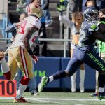 Seahawks running back Christine Michael eyes 49ers safety Jaquiski Tartt, left, on his way to the end zone for the touchdown Sunday afternoon at Century Link Field in Seattle on September 25, 2016. The Seahawks are 2-1 after defeating the 49ers 37-18. (Kevin Clark / The Herald)