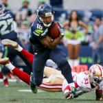 Seahawks wide receiver Tyler Lockett eludes 49ers corner back Rashard Robinson for more yards Sunday afternoon at Century Link Field in Seattle on September 25, 2016. The Seahawks are 2-1 after defeating the 49ers 37-18. (Kevin Clark / The Herald)