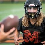 Monroe&rsquo;s JJ Jerome tracks the ball while playing defense during practice Thursday afternoon at Monroe High School. (Kevin Clark / The Herald)