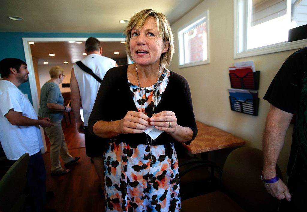 Wendy Grove, seen here as people arrive for lunch, created Everett Recovery Cafe after volunteering and working at a similar facility in Seattle. (Dan Bates / The Herald)