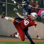 Snohomish&rsquo;s Hayden DeYoung (bottom) breaks up a pass intended for Glacier Peak&rsquo;s Bo Burns during Friday night&rsquo;s game at Veterans Memorial Stadium. (Kevin Clark / The Herald)