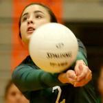 Jackson&rsquo;s Korynne Leon makes a bump pass against Monroe Wednesday night at Monroe High School. (Kevin Clark / The Herald)