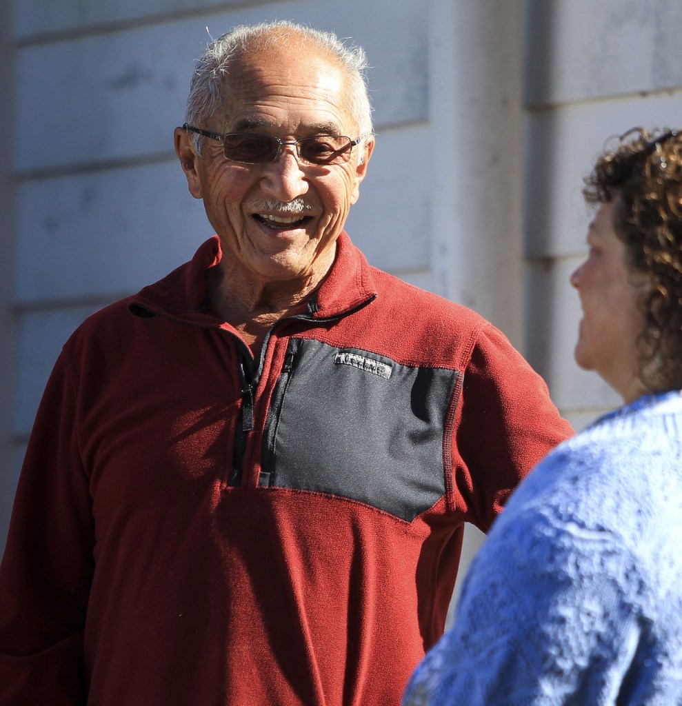 Al Taniguchi, a member of the The Seven Lakes Baptist Church, is helping to restore the siding of his church with help from the Lakewood ward of the Church of Jesus Christ of Latter-day Saints. &ldquo;It&rsquo;s a real blessing for us,&rdquo; Taniguchi said. (Ian Terry / The Herald)