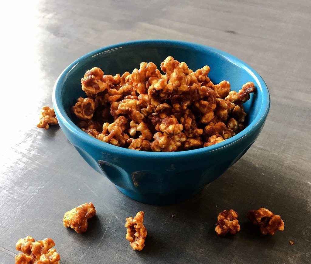 This caramel corn can be spiced up with chipotle and cinnamon. (Dudley M. Brooks / Washington Post)