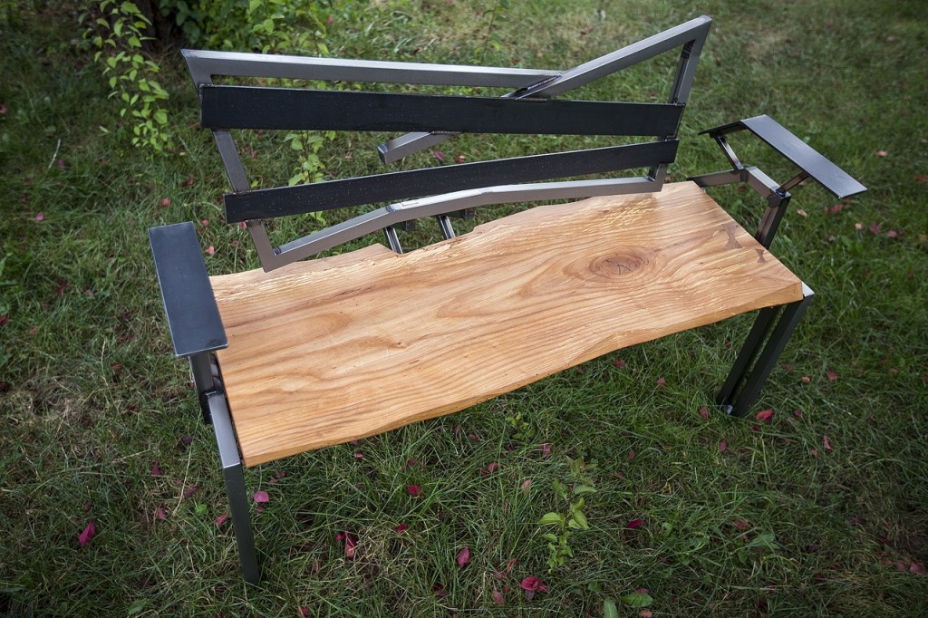 Along with his sculpture work, Sean Carleton also combines his carpentry knowledge and metalwork skills to build high end furniture. (Ian Terry / The Herald)