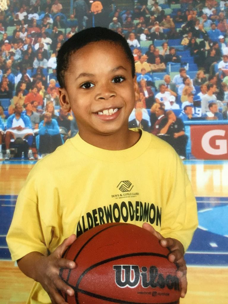 University of Washington running back Myles Gaskin shown as a child playing basketball for the Alderwood Boys and Girls Club in Lynnwood. (Gaskin family photo)