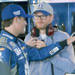Dale Earnhardt Jr. (right) listens to Jeff Gordon as they stand in the garage before Saturday&rsquo;s practice for Sunday&rsquo;s NASCAR Sprint Cup at Dover International Speedway in Dover, Del. (AP Photo/Mel Evans)
