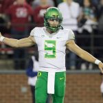 Oregon quarterback Dakota Prukop walks onto the field during the first half of a game against Washington State this past Saturday in Pullman. (AP Photo/Young Kwak)