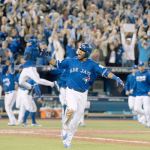 Toronto&rsquo;s Edwin Encarnacion celebrates after hitting a walk-off three-run home run during the 11th inning of the American League wild-card game on Tuesday in Toronto. The Blue Jays beat the Orioles 5-2. (Mark Blinch/The Canadian Press via AP)