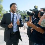 New York Knicks guard Derrick Rose arrives at U.S. District Court in downtown Los Angeles on Thursday, where his attorney asked for a mistrial in a civil suit brought against Rose by an ex-girlfriend. (AP Photo/Damian Dovarganes)