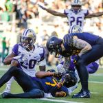 Washington defensive back Kevin King (20) celebrates knocking a pass down intended for Oregon wide receiver Darren Carrington II (7) as Oregon tight end Johnny Mundt (83) approaches during a game Saturday in Eugene, Ore. (AP Photo/Thomas Boyd)