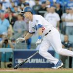 Los Angeles&rsquo; Chase Utley watches his RBI single during the eighth inning that provided the winning run in the Dodgers 6-5 win over the Washington Nationals in Game 4 of the National League Division Series on Tuesday in Los Angeles. (AP Photo/Jae C. Hong)