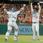 Los Angeles&rsquo; Clayton Kershaw (22) and catcher Carlos Ruiz celebrate after Kershaw struck out Washington&rsquo;s Wilmer Difo to give the Dodgers a 4-3 win over the Nationals in Game 5 of the National League Division Series on Thursday in Washington. (AP Photo/Alex Brandon)