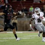 Washington State running back Jamal Morrow (25) runs past Stanford linebacker Mike Tyler during the second half of a game last Saturday in Stanford, Calif. (AP Photo/Marcio Jose Sanchez)