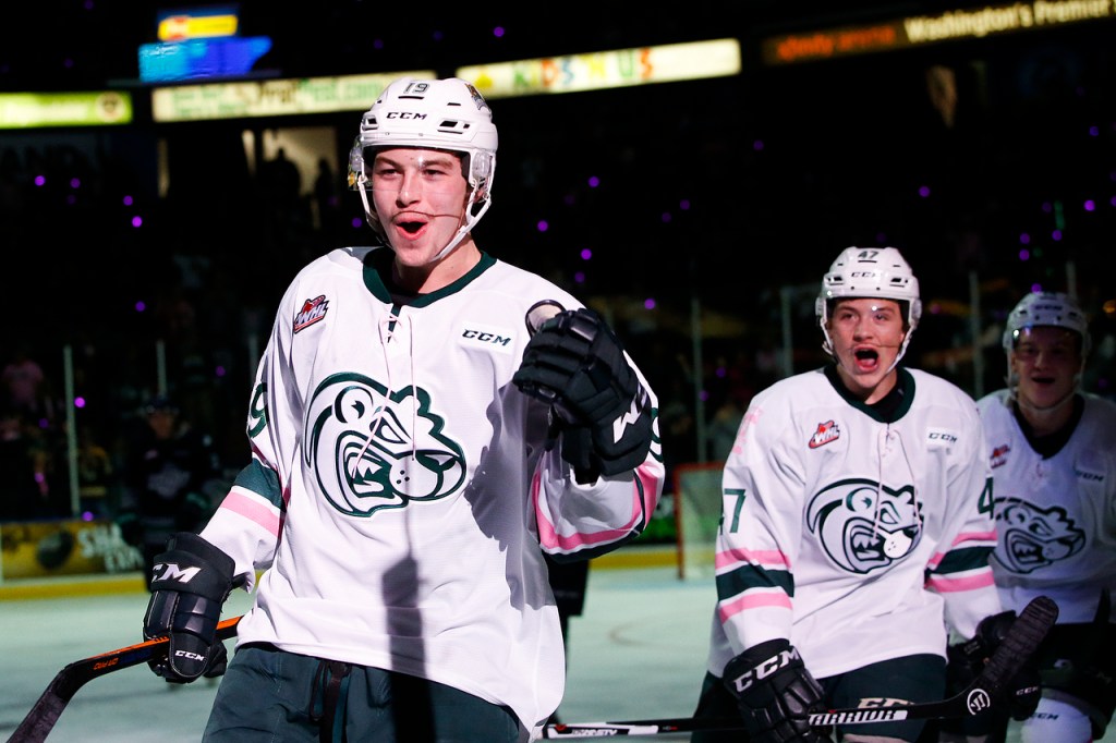 Silvertips right wing Bryce Kindopp (left) celebrates a goal in the first period during a game against Seattle on Saturday at Xfinity Arena in Everett. (Ian Terry / The Herald)