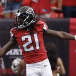 Falcons cornerback Desmond Trufant (21), a former star at the University of Washington, celebrates picking off Buccaneers quarterback Jameis Winston (3) during the first half of a game Sept. 11 in Atlanta. (AP Photo/David Goldman)