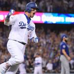 The Dodgers&rsquo; Yasmani Grandal rounds the bases after hitting a two-run home run during the fourth inning of Game 3 of the National League Championship Ceries against the Cubs on Tuesday in Los Angeles. (AP Photo/Mark J. Terrill)