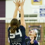 Lake Stevens&rsquo; Grace Schroedl (4) and Glacier Peak&rsquo;s Sydney Petersen (34) go up for a tip during a game at Lake Stevens High School on Tuesday, Oct. 18. (Ian Terry / The Herald)